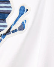 Kids Drew Embroidered Graphic Tee in white jersey, featuring a large, prominent chest Psycho Bunny skull logo with blue, light blue, and dark blue striped embroidery, outlined in white. (5)
