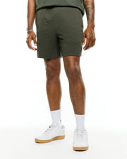 Mens Arlen Seersucker Short in olive green, featuring a relaxed fit and distinctive puckered seersucker fabric texture with an elastic waistband. No visible Psycho Bunny logo. (1)