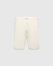 Mens Devon Knit Short in cream, a relaxed fit short crafted from a distinctive textured waffle knit fabric, featuring a ribbed waistband and an adjustable drawstring. (5)