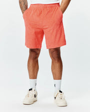 Mens Tristan Short in vibrant coral, a relaxed fit short with an all-over raised quilted diamond pattern on soft, textured terry fabric, perfect for refined streetwear. (1)
