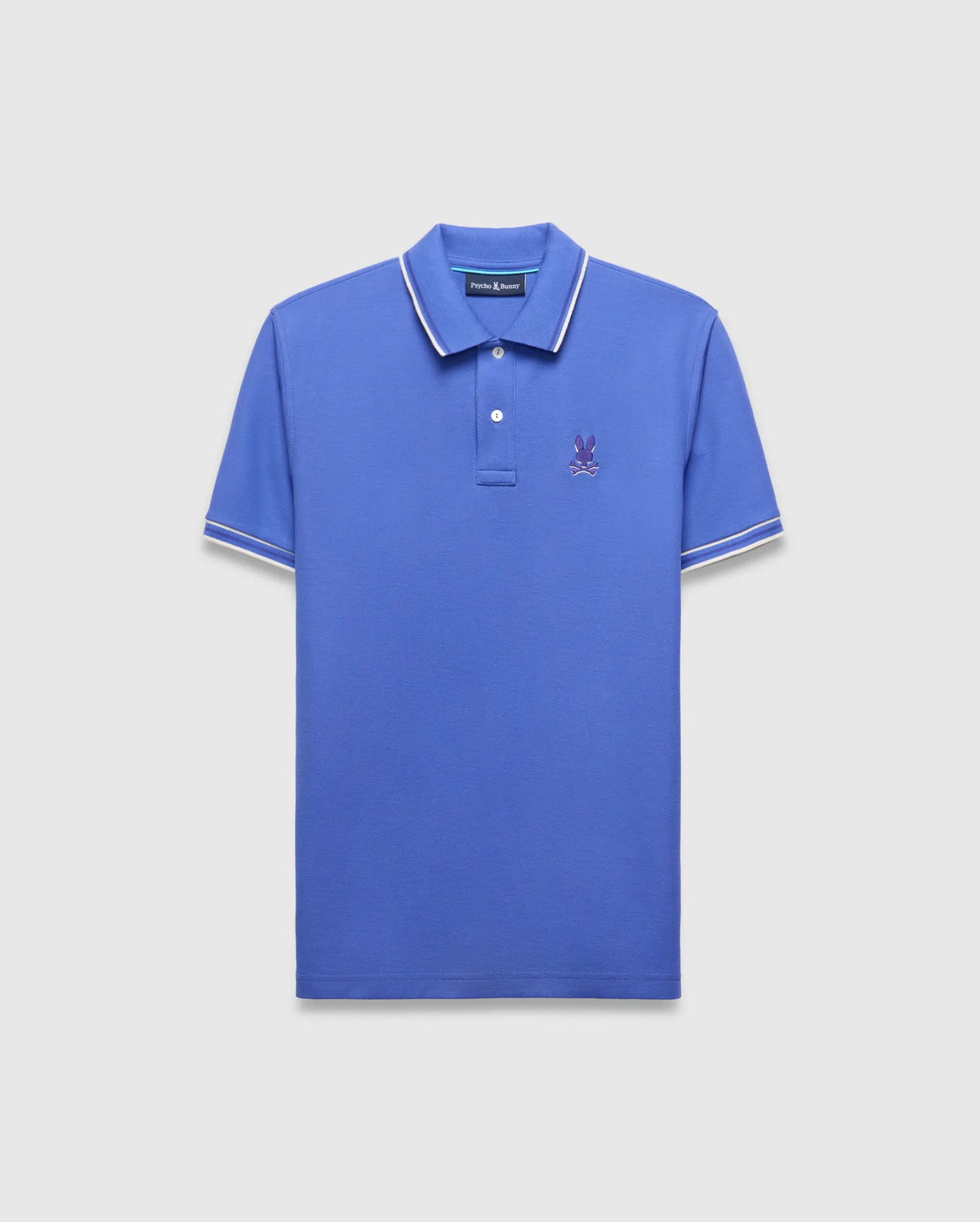 Mens Brad Pique Polo in vibrant blue, classic fit, with white tipped collar and sleeves, featuring a small purple embroidered Psycho Bunny skull logo on the left chest. (4)