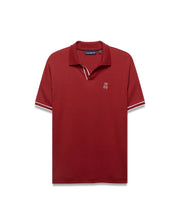 Men's Nasser Johnny Collar Polo, a classic fit deep red jersey polo with a Johnny collar, white tipping on collar and ribbed cuffs, and a small white embroidered Psycho Bunny skull logo on the left chest. (5)