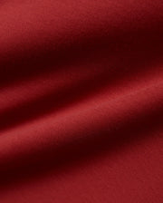 Psycho Bunny Men's Nasser Johnny Collar Polo in a vibrant, deep crimson red, crafted from premium, soft-touch jersey knit fabric, embodying refined streetwear style. (6)