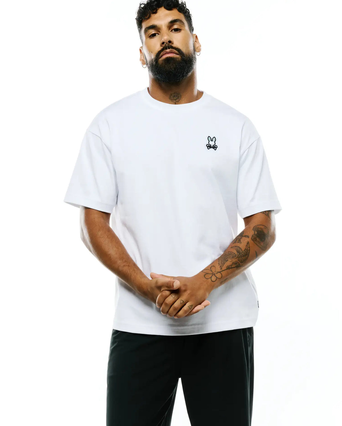 Mens Jaydon Pima Cotton Oversized-Fit Tee, a white smooth Pima cotton jersey t-shirt featuring a small black embroidered Psycho Bunny skull logo on the left chest. (1)