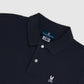 A close-up of the Psycho Bunny MENS CLASSIC POLO - B6K001ARPC, crafted from 100% Pima cotton, featuring elegant mother-of-pearl buttons.