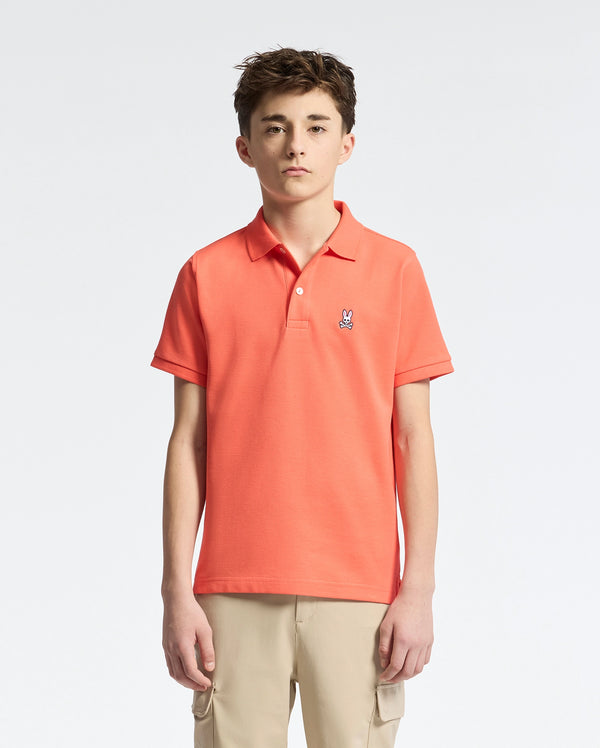 Teen | Kids' hot coral Psycho Bunny classic polo with embroidered logo, ribbed collar, and soft Pima cotton fabric for comfort and style.