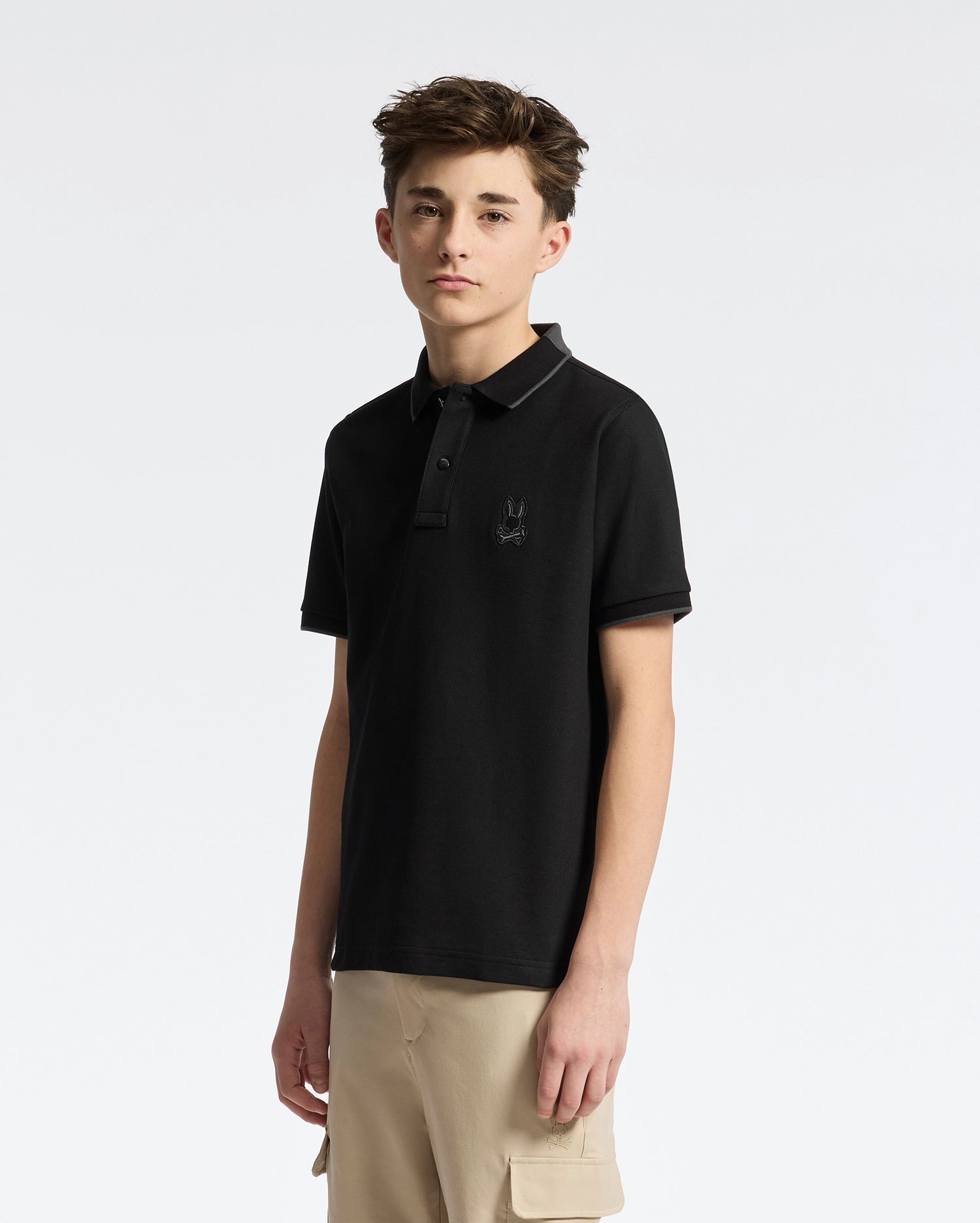 Teen | Kids' black New Castle Piqué Polo by Psycho Bunny, featuring an embroidered logo, and soft Pima cotton for a sleek, comfortable fit.