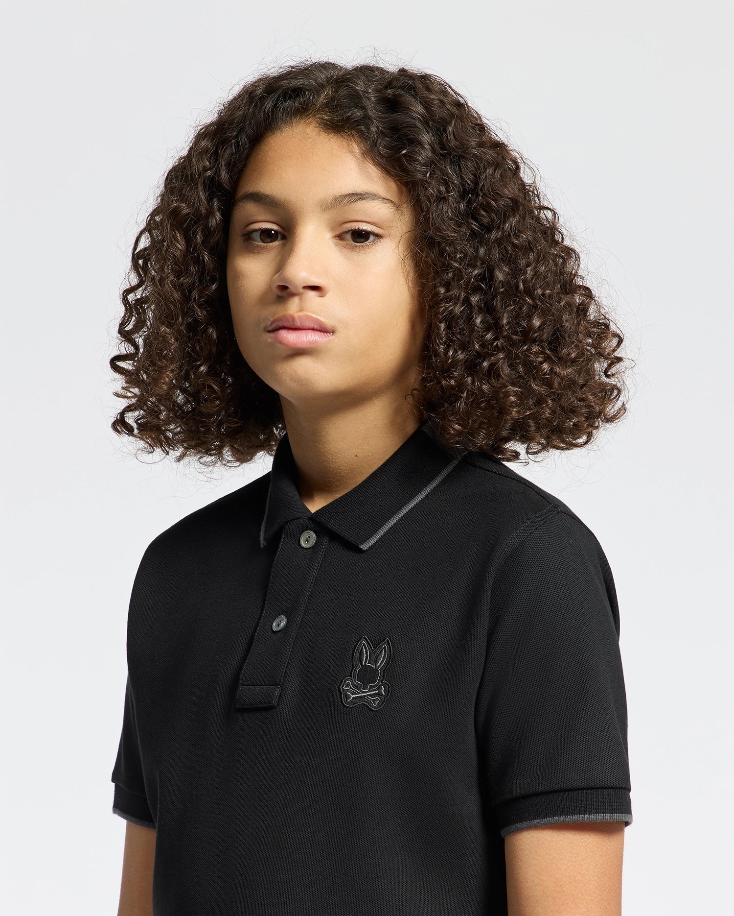 Kids | Kids' black New Castle Piqué Polo by Psycho Bunny, featuring an embroidered logo, and soft Pima cotton for a sleek, comfortable fit.