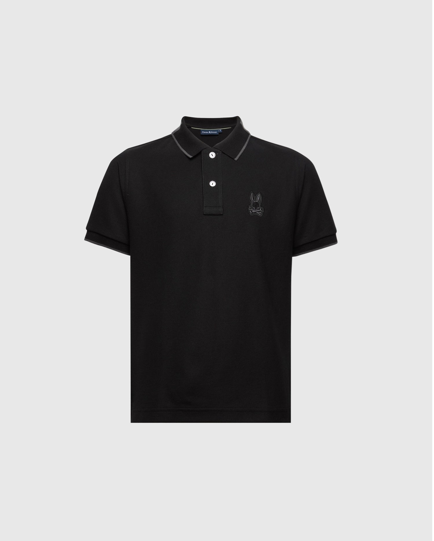 The KIDS NEW CASTLE PIQUE POLO by Psycho Bunny (B0K487F200) is a black polo crafted from luxurious Pima cotton, featuring short sleeves, a buttoned collar, and an embroidered Bunny on the chest. Displayed against a plain white background.