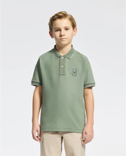 Kids | Kids' New Castle Piqué Polo in green by Psycho Bunny, featuring an embroidered logo and a classic design for a stylish, polished look.