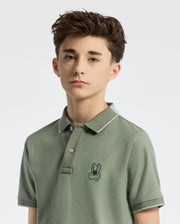 Teen | Kids' New Castle Piqué Polo in green by Psycho Bunny, featuring an embroidered logo and a classic design for a stylish, polished look.