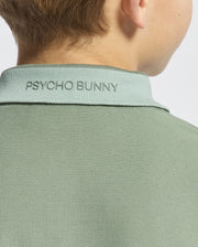 Kids | Kids' New Castle Piqué Polo in green by Psycho Bunny, featuring an embroidered logo and a classic design for a stylish, polished look.