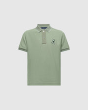 The Psycho Bunny KIDS NEW CASTLE PIQUE POLO B0K487F200 offers all-day comfort. This green polo shirt features soft Pima cotton, a small embroidered rabbit on the left chest, short sleeves, a ribbed collar with white piping, and a buttoned placket. It's a timeless wardrobe staple.