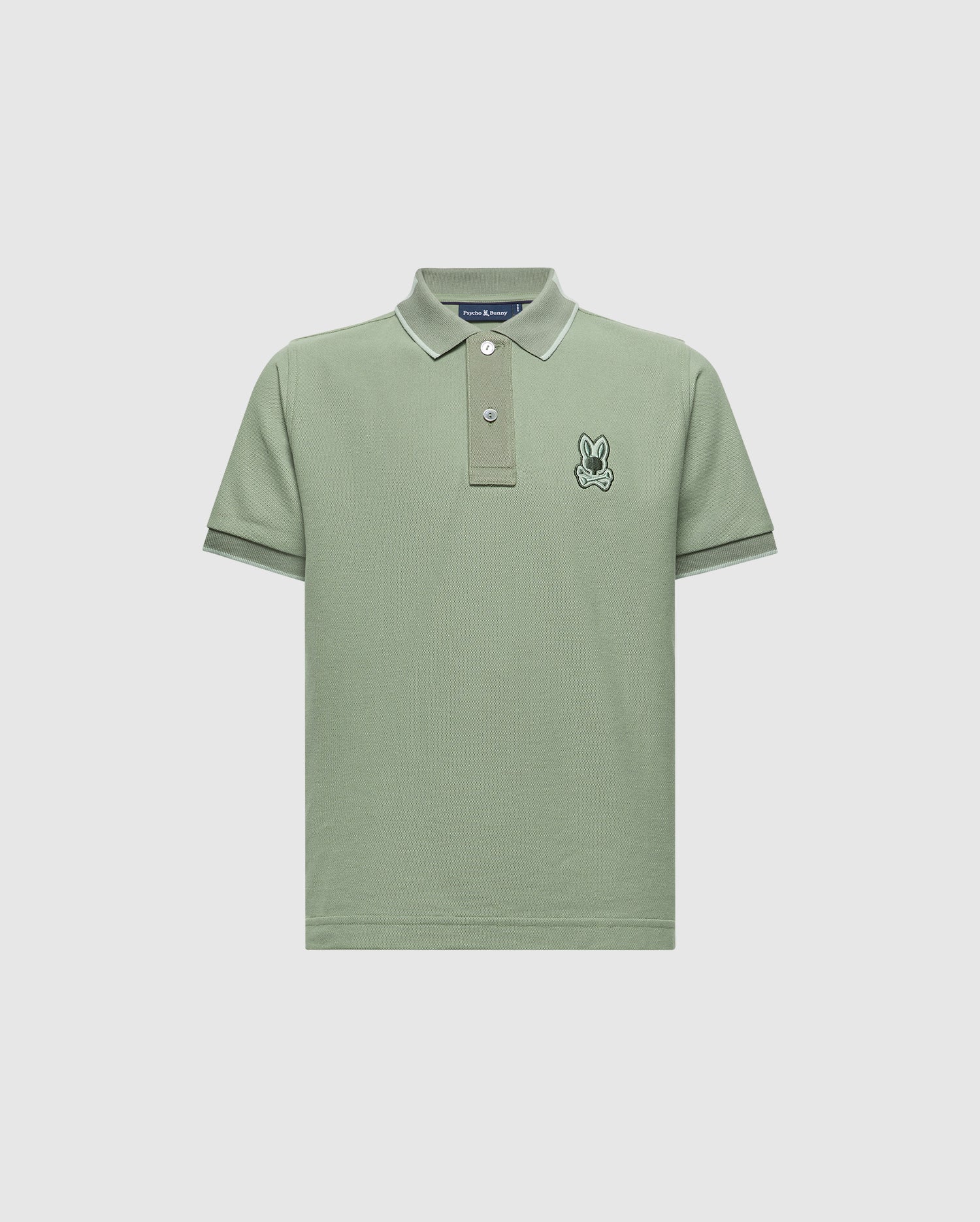 The Psycho Bunny KIDS NEW CASTLE PIQUE POLO B0K487F200 offers all-day comfort. This green polo shirt features soft Pima cotton, a small embroidered rabbit on the left chest, short sleeves, a ribbed collar with white piping, and a buttoned placket. It's a timeless wardrobe staple.