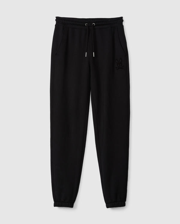A pair of black Kids Pacific Chenille Jogger pants, designed by Psycho Bunny, featuring an elastic waistband with a drawstring and two side pockets. These joggers have elasticized ankle cuffs and are adorned with a subtle embroidered logo on the upper left side. Displayed against a plain light gray background, this setup perfectly highlights the casual style of these jogger pants.