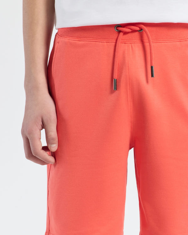 Teen | Kids' Levanzo French Terry Sweatshort in hot coral by Psycho Bunny, featuring a comfortable fit, soft fabric, and embroidered logo for a casual, stylish look.