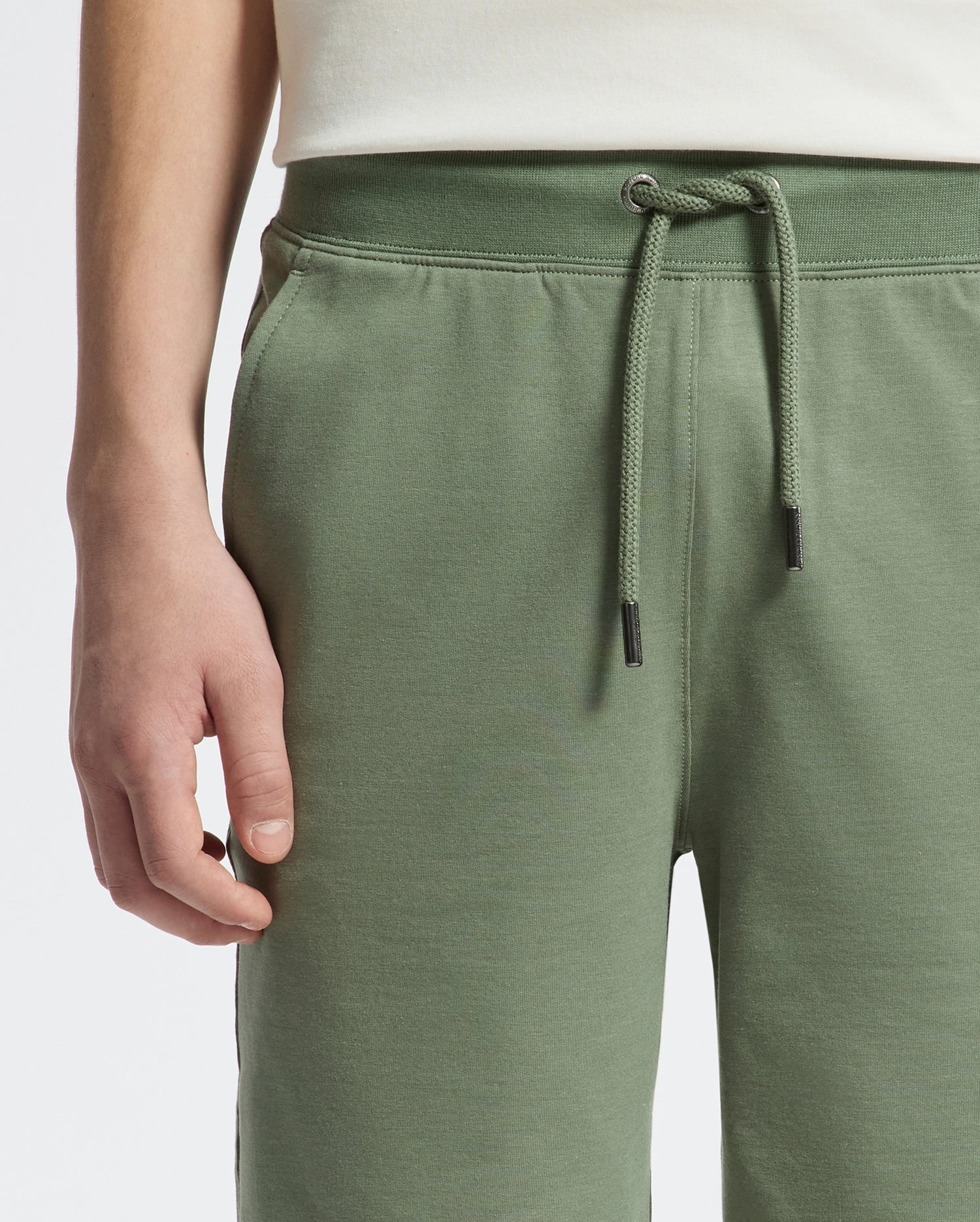 Teen | Kids' French terry sweatshorts with a soft feel, elastic waistband, and side pockets for comfort.