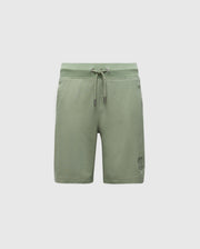 The KIDS LEVANZO FRENCH TERRY SWEATSHORT by Psycho Bunny features a drawstring waist and a small embroidered design on the lower left. Made from stretch cotton jersey, these green shorts offer soft comfort perfect for casual wear against a plain white background.