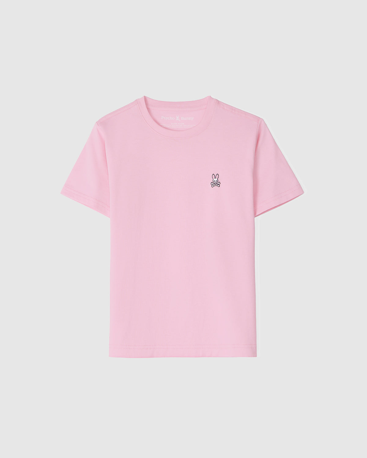The Psycho Bunny KIDS CLASSIC CREW NECK TEE (B0U014CRPC) showcases a delightful light pink design, complemented by a small embroidered bunny logo on the left chest. Crafted from 100% Pima cotton, this tee is an excellent choice for back-to-school outfits, featuring short sleeves and a straightforward design set against a plain white backdrop.