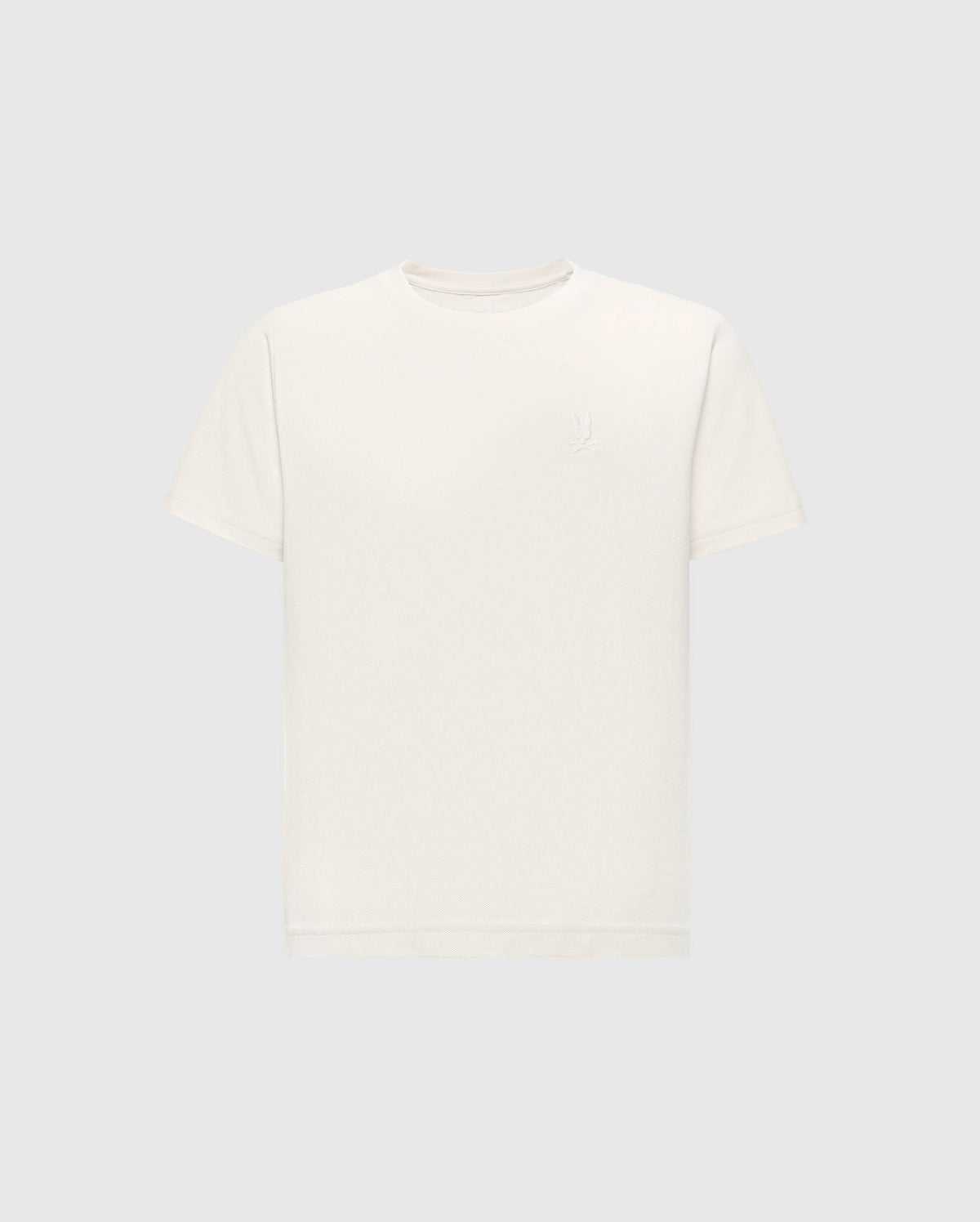 The KIDS TAYLOR PIQUE TEE (B0U579F200) by Psycho Bunny is a regular-fit, white, short-sleeve tee made of lightweight Pima cotton with an embroidered Bunny logo on the upper left side and set against a light gray background.