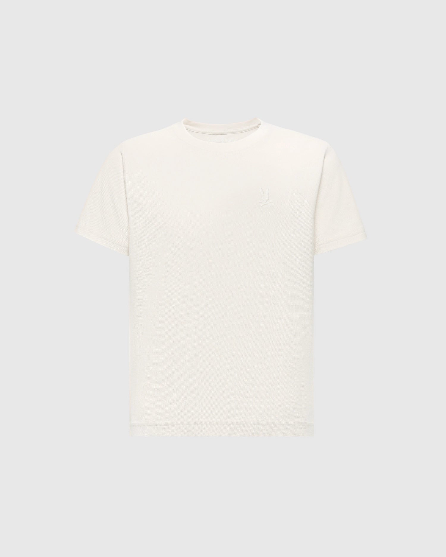 The KIDS TAYLOR PIQUE TEE (B0U579F200) by Psycho Bunny is a regular-fit, white, short-sleeve tee made of lightweight Pima cotton with an embroidered Bunny logo on the upper left side and set against a light gray background.