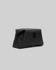 The Psycho Bunny MENS RUBBERIZED TOILETRY KIT - B6A636F200 is a black rectangular bag with a zip closure and embossed bunny skull logo, ideal for organizing travel essentials, shown on a plain gray background.
