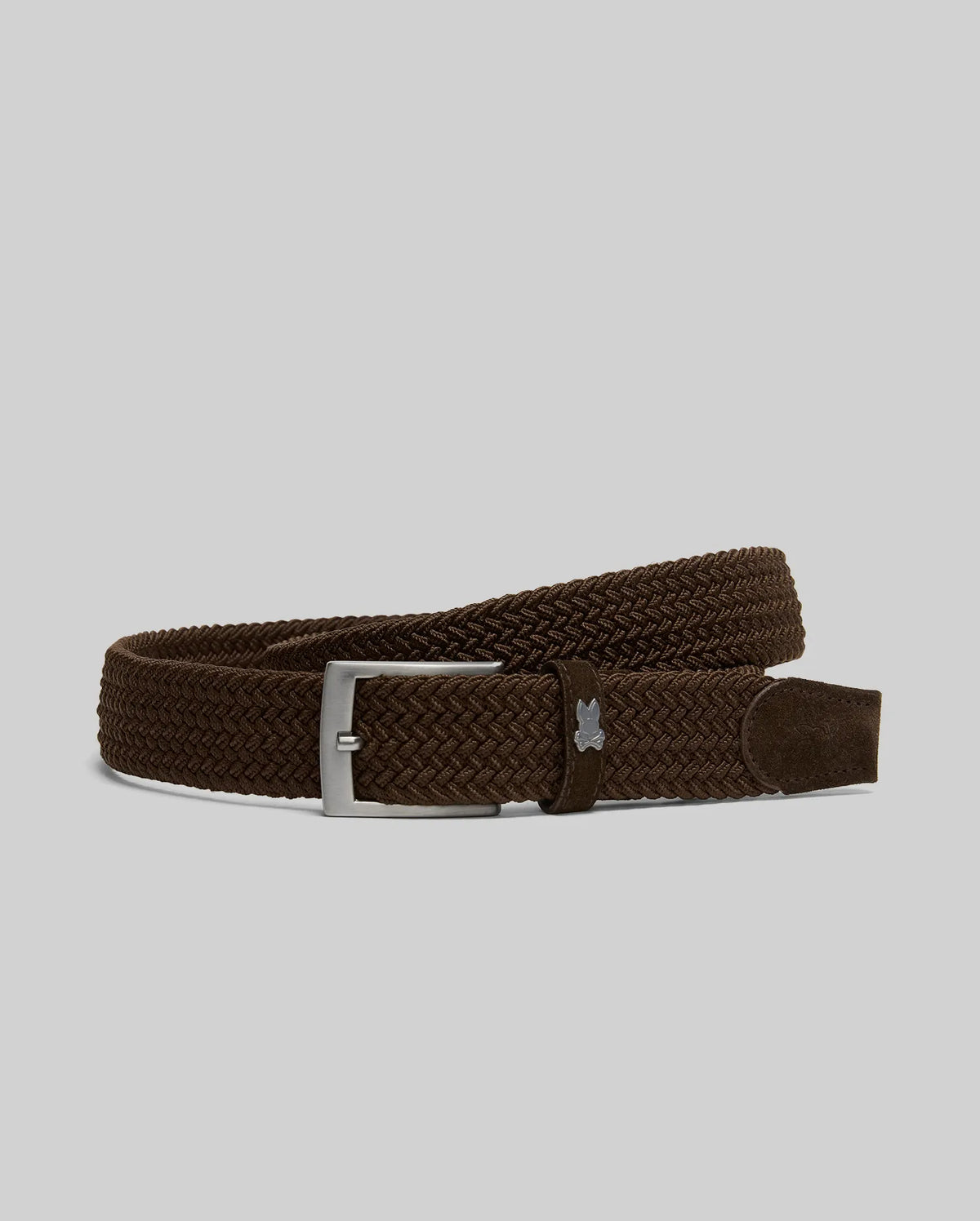 The Psycho Bunny MENS STRETCH BRAIDED BELT - B6A890F200 features a dark brown braided design with a silver rectangular buckle, shown on a light gray background—ideal for any occasion.