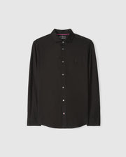 The Psycho Bunny Men's Arthur Jersey Shirt (B6C748D200) is a black long-sleeve button-up crafted from Pima cotton. It features a small embroidered logo on the chest and is displayed against a light gray background. With its classic collar and white buttons, this shirt offers both style and comfort for any occasion.