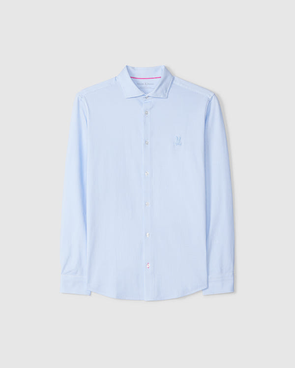 The Psycho Bunny MENS BROOK STRIPED JERSEY SHIRT - B6C750D200 in light blue is displayed against a plain background. This long-sleeve button-up shirt is crafted from Pima cotton and features subtle vertical stripes, a collar, and a small embroidered emblem on the chest. It offers a comfortable fit with white buttons and maintains a clean, crisp appearance.