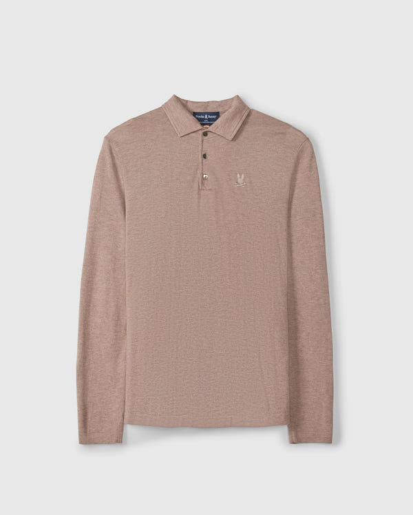 Introducing the Psycho Bunny Men's Bradshaw Polo Sweater, Beige - B6E835D200, a luxurious knitwear piece crafted from soft Merino wool. This polo features long sleeves, a classic collar with a refined three-button placket, and is enhanced by its textured fabric for added elegance. A small embroidered rabbit motif logo on the left chest elevates its sophisticated appeal.