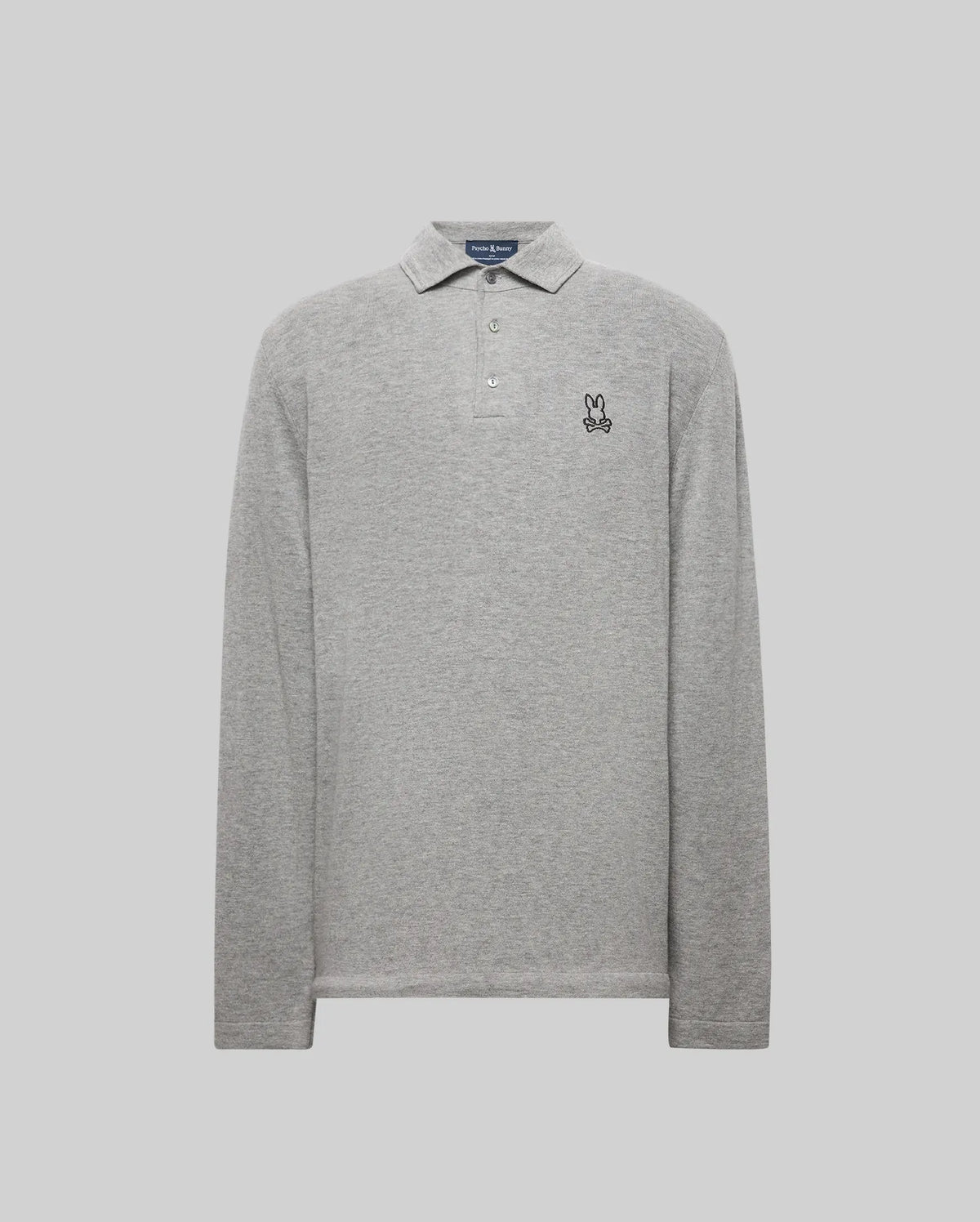 The Psycho Bunny MENS BRADSHAW POLO SWEATER (B6E835D200) is a light grey, long-sleeve merino wool polo with a collar, three mother of pearl buttons, and a small embroidered bunny outline on the left chest. Displayed on a plain light grey background.