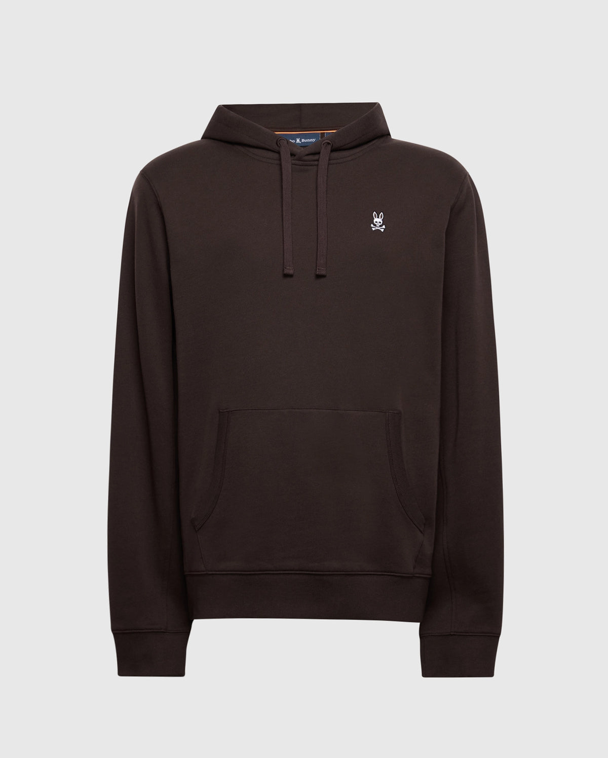 The Psycho Bunny Men's Levy Essential Fleece Hoodie (B6H859D200) is crafted from 100% cotton in a dark brown hue, utilizing soft French terry for comfort. It features long sleeves, a front pocket, drawstrings, and a small rabbit logo on the chest. The plain gray background emphasizes its stylish simplicity.
