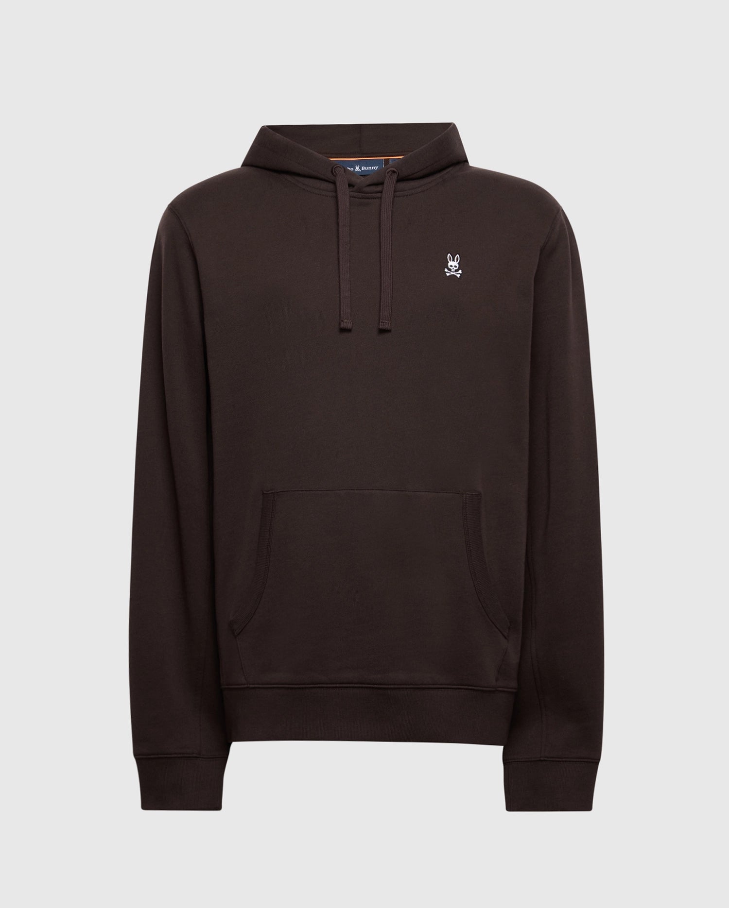 The Psycho Bunny Men's Levy Essential Fleece Hoodie (B6H859D200) is crafted from 100% cotton in a dark brown hue, utilizing soft French terry for comfort. It features long sleeves, a front pocket, drawstrings, and a small rabbit logo on the chest. The plain gray background emphasizes its stylish simplicity.