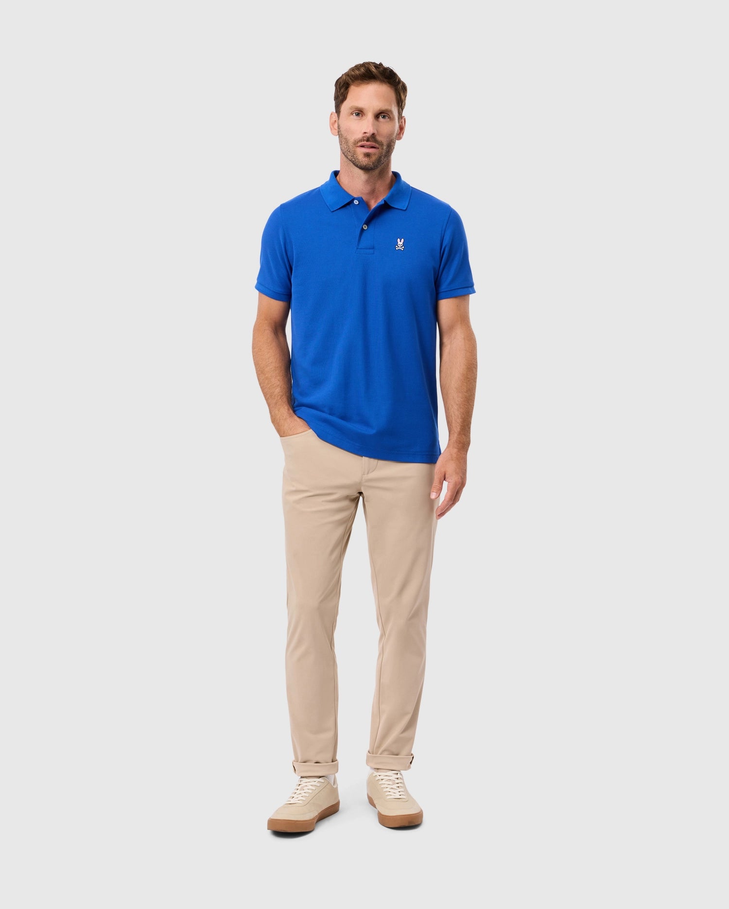 Blue polo shirt and khaki pants shop