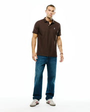 Men's Classic Pima Pique Polo in rich brown, featuring a classic fit, two-button placket, and a small embroidered white Psycho Bunny skull logo on the left chest. (5)