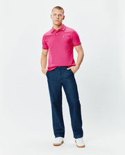 Mens Classic Pique Polo in vibrant pink, featuring a classic fit, two-button placket, and small embroidered Psycho Bunny skull logo on the left chest. (5)