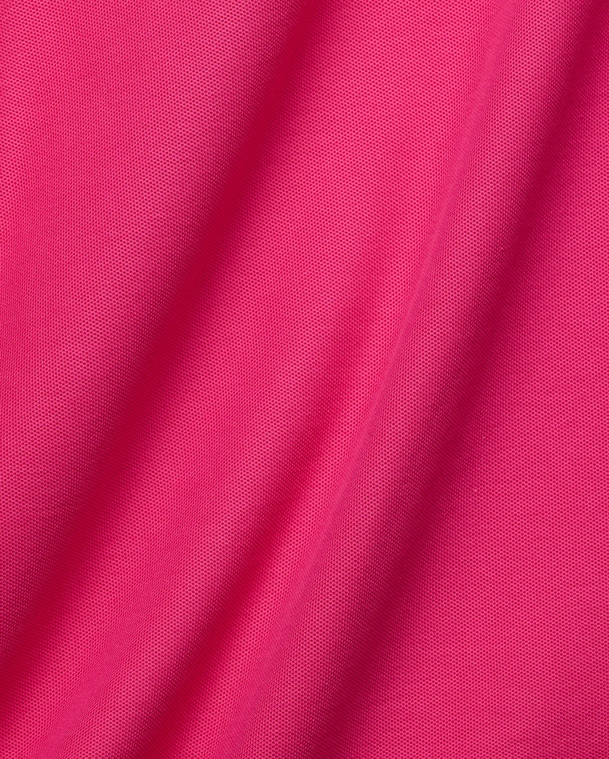 Mens Classic Pique Polo in vibrant fuchsia, crafted from breathable textured pique fabric. Features a classic fit and the iconic small embroidered Psycho Bunny skull logo on the left chest, embodying refined streetwear. (6)