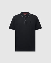 The Psycho Bunny MENS BRYCE PERFORMANCE PIQUE POLO (B6K486F200) is a black polo shirt with short sleeves, crafted from performance pique fabric, featuring white piping along the collar, a two-button placket, and a subtle embroidered logo on the left chest. Displayed against a gray background.