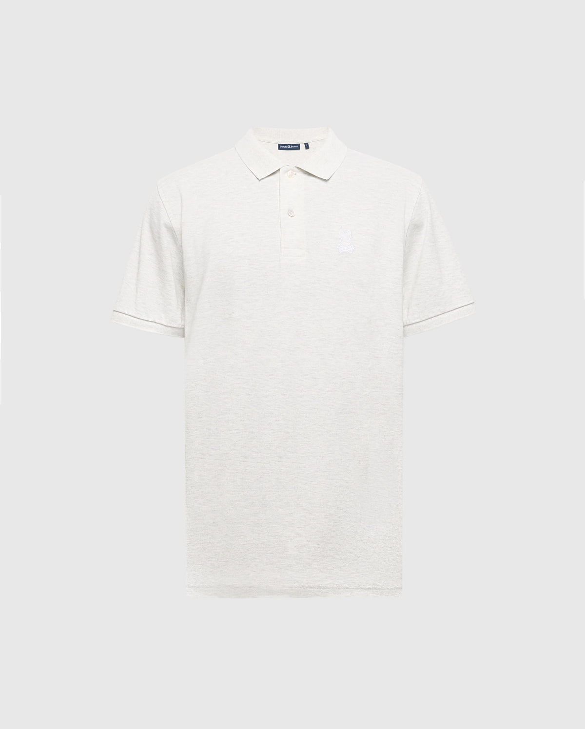 The Psycho Bunny MENS JAMES PIQUE POLO (B6K945D200) is a light gray, slim-fit polo made from soft Pima cotton. It boasts short sleeves, a collar, a three-button placket, and features a subtle embroidered logo on the left chest against a plain white backdrop.