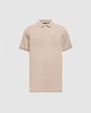 The Psycho Bunny Men's James Premium Pique Polo Shirt - B6K945D200 is a beige, lightweight polo crafted from durable Pima cotton. It includes a collar, short sleeves, and features an embroidered design on the left chest.