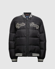 Introducing the MENS FRAZER FASHION PUFFER - B6N338E200 by Psycho Bunny, a sophisticated men's puffer jacket in black. It boasts stylish white striped cuffs and collar, with "Psycho Bunny" embroidered on the front in white for added flair. Its quilted design and convenient front zipper establish it as an essential piece in men's fashion outerwear.