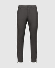 A pair of dark gray MENS MADISON COMMUTER PANT - B6P395Z1WB by Psycho Bunny against a plain background. These slim-fit trousers feature a button and zip closure, belt loops, adjustable hems, and include a detachable Bunny keychain for extra flair.