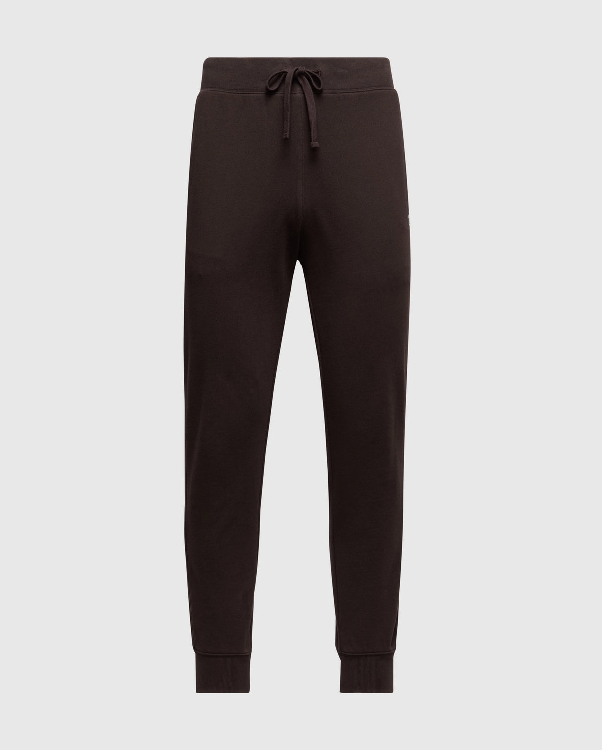 The Psycho Bunny MENS LEVY ESSENTIAL FLEECE SWEATPANT - B6P721D200 features a black jogger design with an elastic waistband and drawstring, cuffed ankles, and is ideal for casualwear. Displayed on a plain white background.