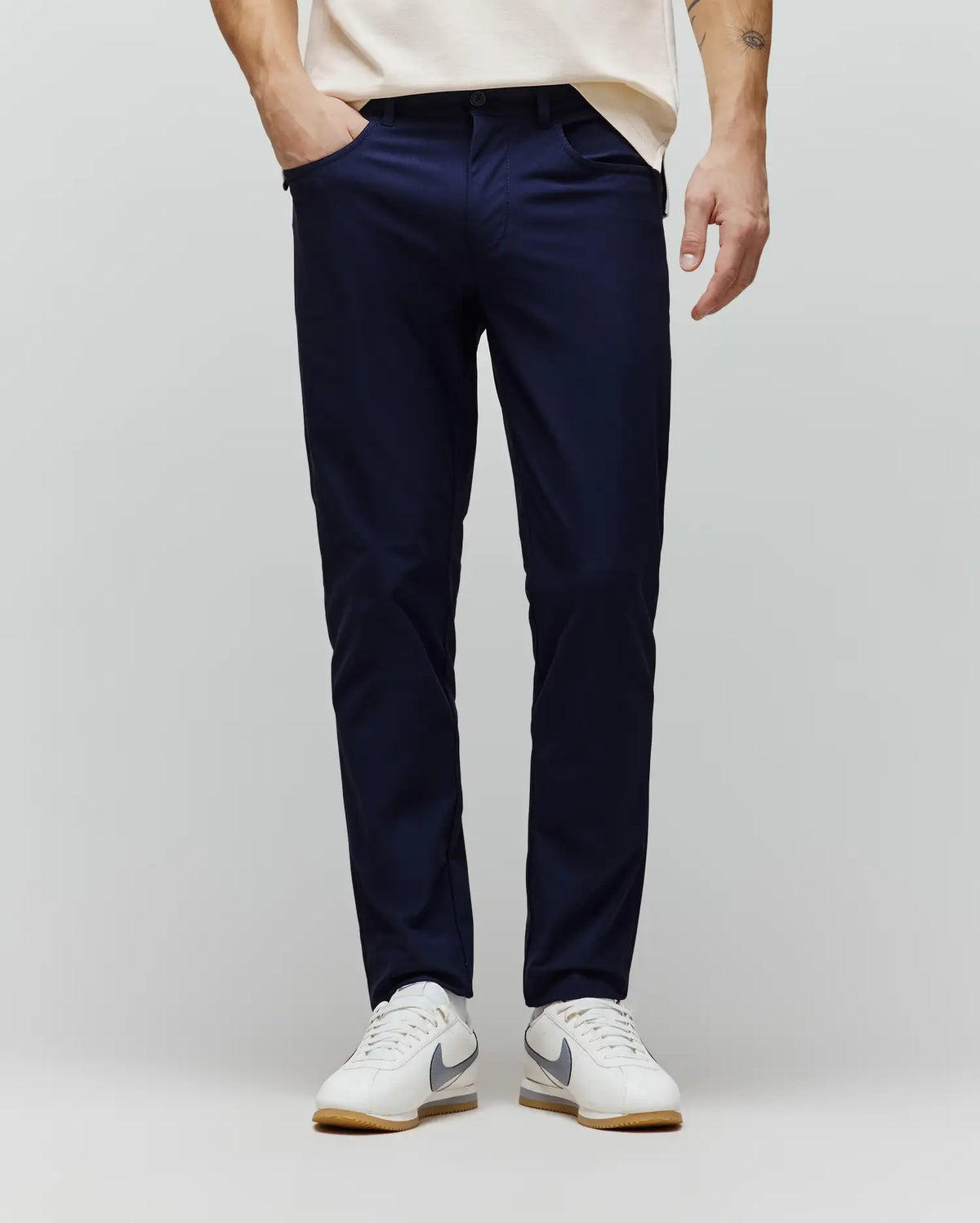 Navy Mens Maverick 10k Step Pant, a slim-fit design crafted from smooth performance fabric, featuring discreet side pockets and no visible Psycho Bunny logo.