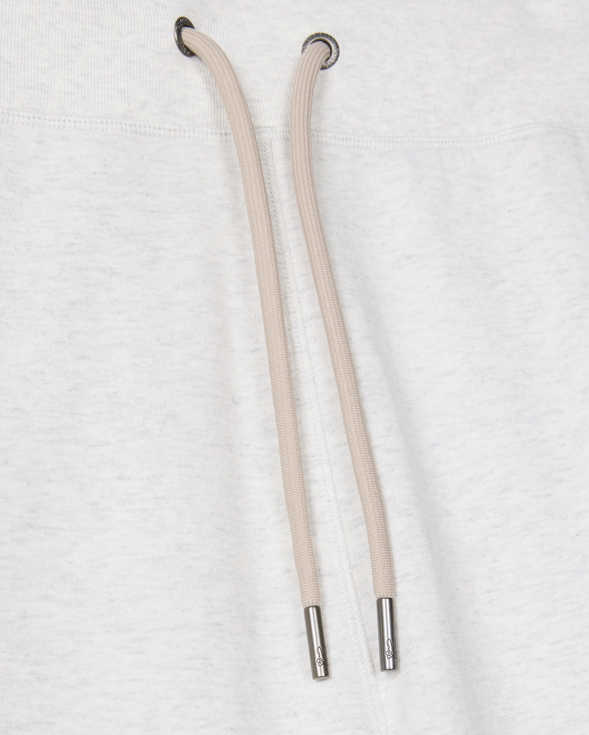 Close-up of a light gray cotton-blend drawstring hoodie featuring two tan drawstrings with metal tips against the fabric. The drawstrings descend from metal eyelets at the neck area, beautifully pairing with Psycho Bunny's MENS JAMES PREMIUM SWEATPANT - B6P791D200 for a stylish and comfortable ensemble.