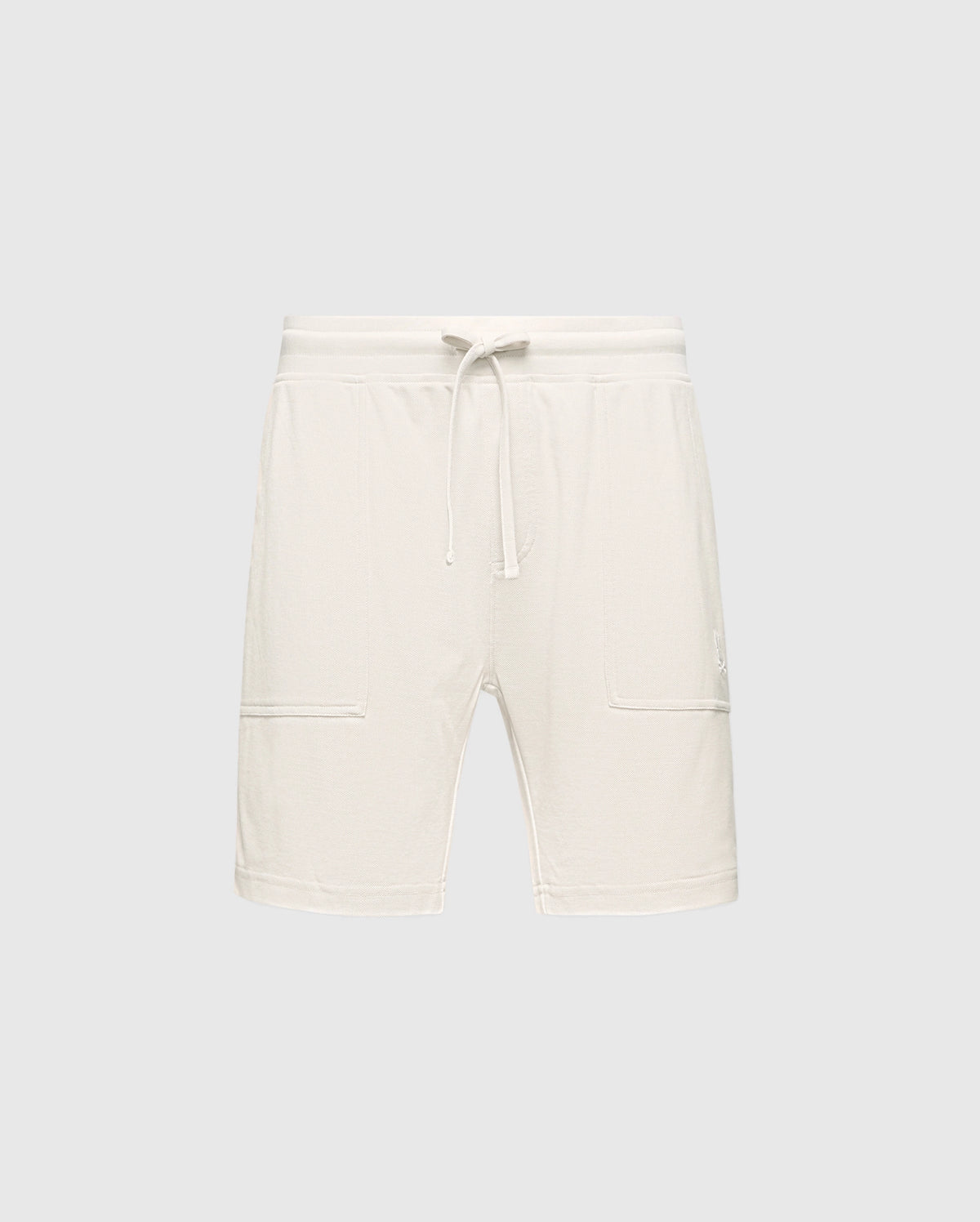 The MENS TAYLOR LIGHT PIQUE SWEATSHORT by Psycho Bunny is crafted from lightweight Pima cotton, featuring an elastic waistband and two front pockets, all showcased against a light gray backdrop for a casual-chic appeal. B6R344F200.