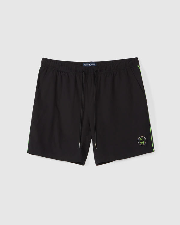 A pair of Psycho Bunny MENS SONTERRA STRIPE SPORT SHORT - B6R464C200 in black with an elastic waistband and drawstring. Made from quick-drying, breathable fabric, these shorts feature green accent stripes along the sides and a small green logo on the lower left leg. Two side pockets are also visible.