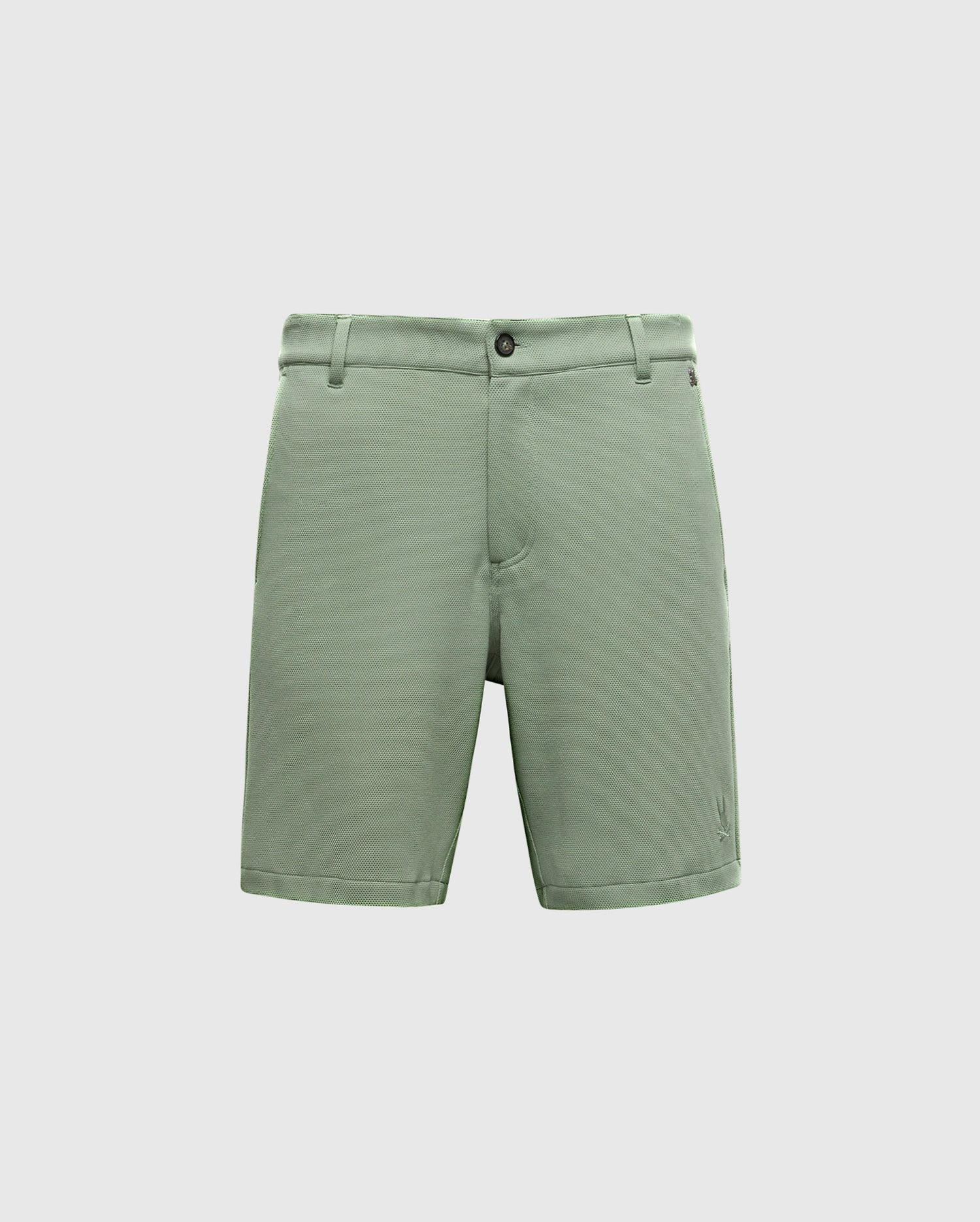 Psycho Bunny's Mens Shiro Knit Honeycomb Short in light green features a button and zip closure, belt loops, and side pockets. Made from honeycomb piqué fabric, it is presented against a plain white background.