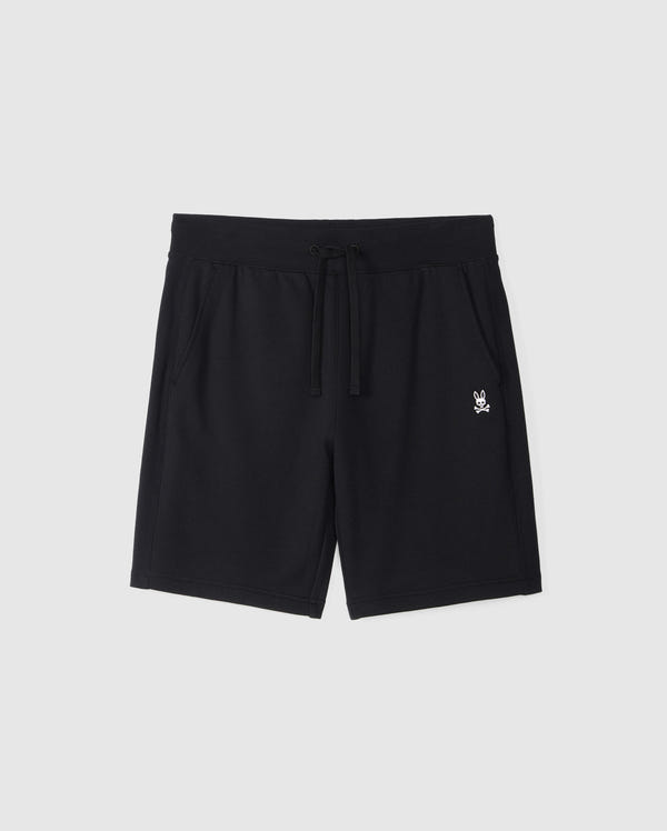 Introducing the MENS LEVY FLEECE SWEATSHORT - B6R862D200 by Psycho Bunny: These black French terry shorts feature an elastic waistband with an adjustable drawstring, side pockets, and a small white skull and crossbones logo on the left thigh. Made of cotton, these sweatshorts sport a clean, minimalist design that makes them perfect as an everyday staple.
