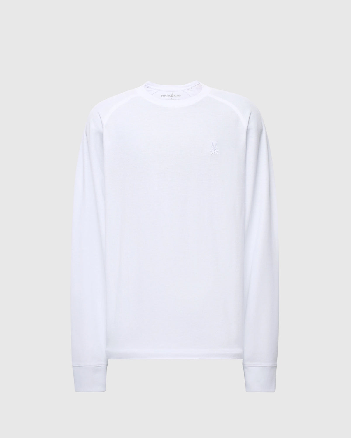 The Psycho Bunny MENS TAYLOR PIQUE LONG SLEEVE TEE (B6T580F200) features a white crew neck design on a plain gray background, accentuated by a subtle embroidered Bunny logo on the left chest. Crafted from soft Pima cotton with ribbed cuffs for a minimalist touch.